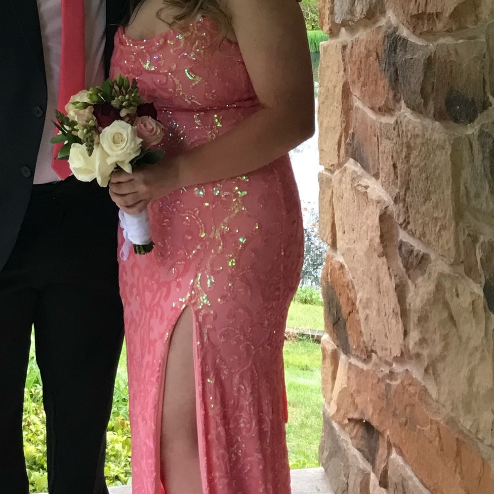 It’s prom season!! Take home this lovely bubblegum pink colored dress!